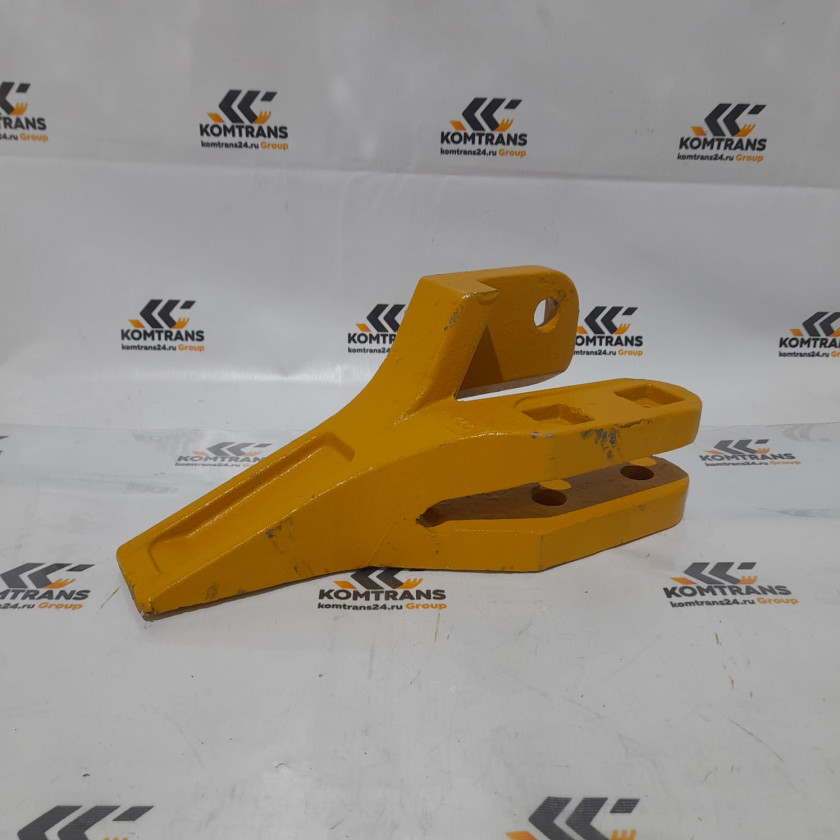 Зуб ковша боковой левый LW500/LG953 не оригинал (желтый) Зуб ковша боковой левый LW500/LG953 не оригинал (желтый)